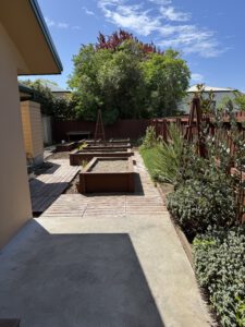 planter boxes in back garden of a property in Christchurch
