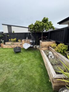 gardening planter boxes in a back garden of a property in Christchurch